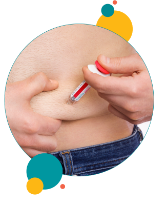 close-up of person injecting syringe into stomach