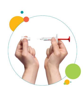 close-up of hands uncapping syringe